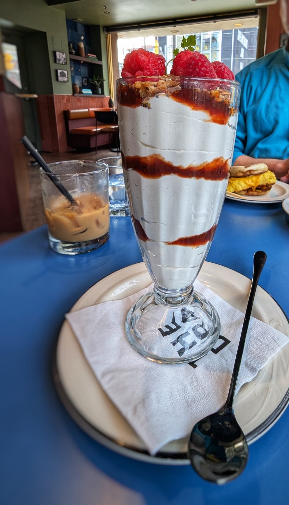 yogurt and chia pudding with wild berry compote and granola at The Drake Cafe