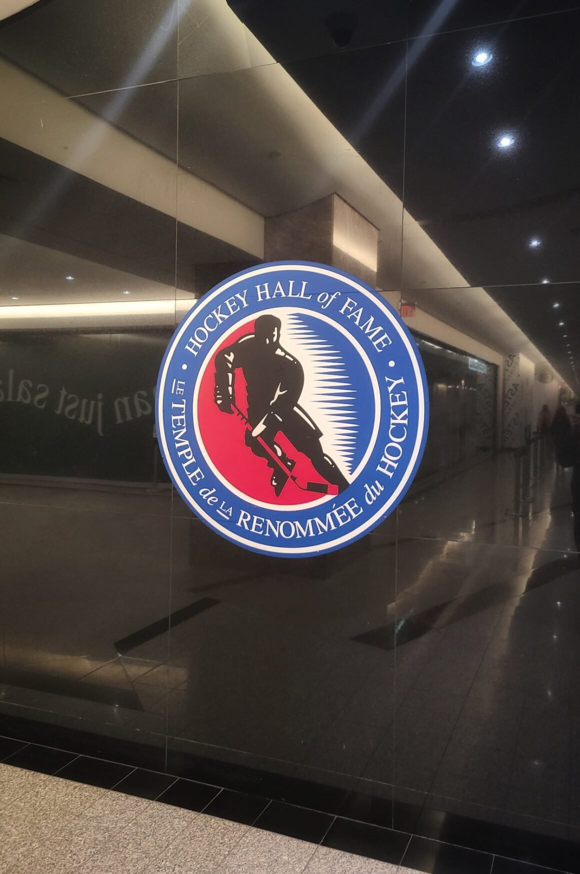 Hockey Hall of Fame logo on wall