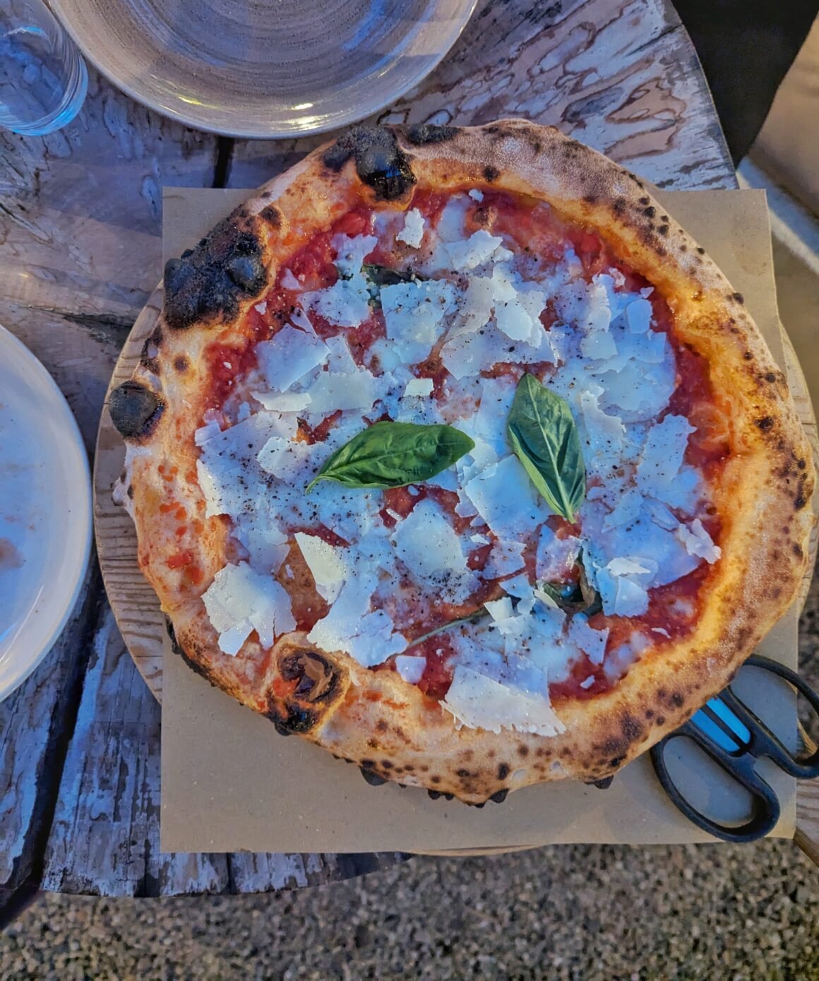 La Romana pizza, a margherita pizza covered in pecorino and black pepper at souldough in Cascais, Portugal