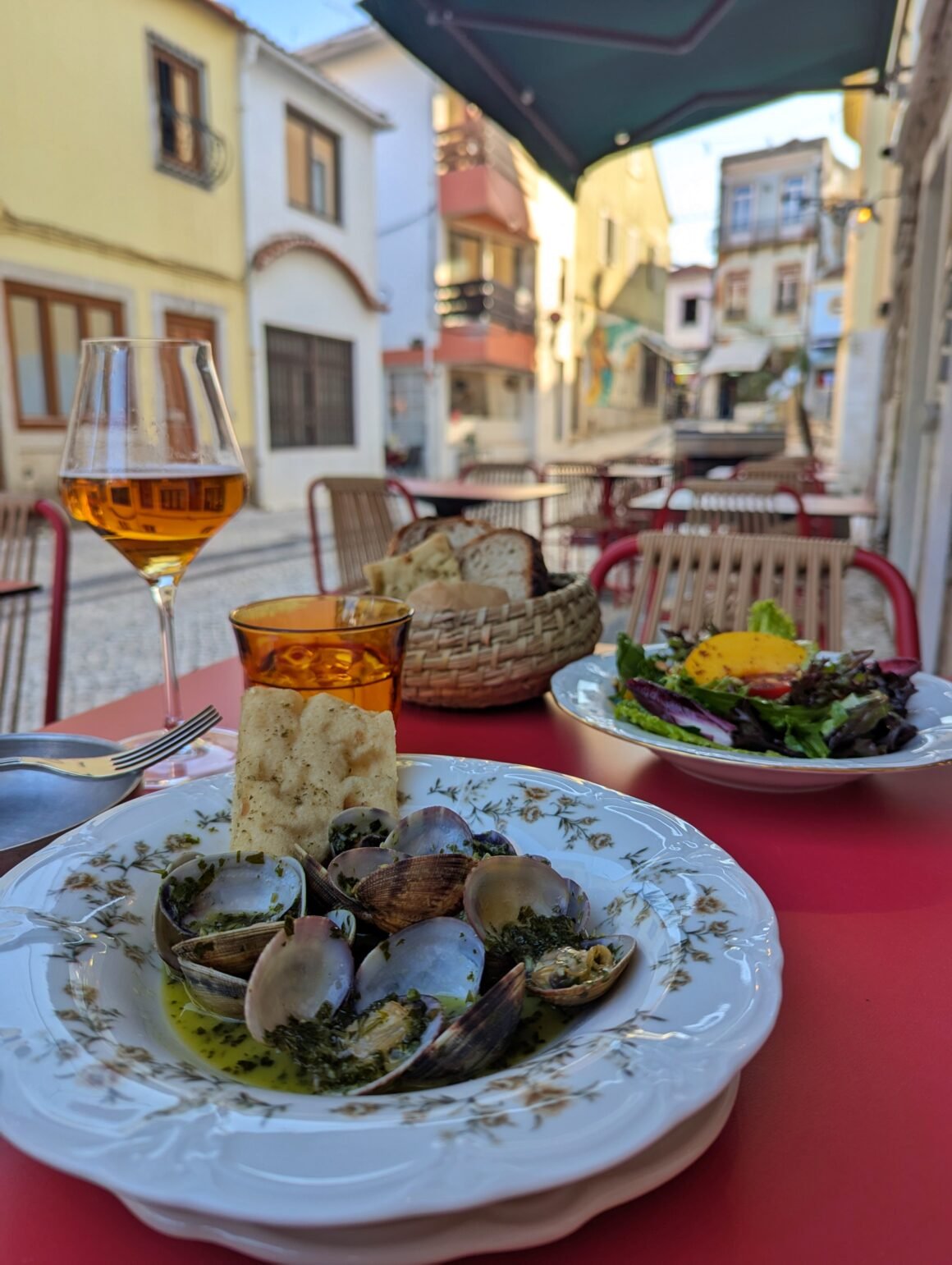 clams, farmers market salad and bread basket at Almina in Cascais, Portugal