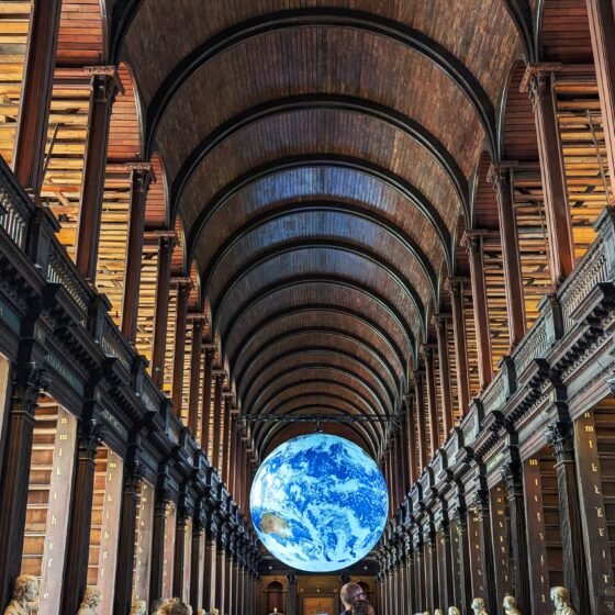 Gaia inside the Long Room of the Old Library at Trinity College in Dublin, Ireland