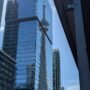 CN Tower reflection on buildings in downtown Toronto, Canada
